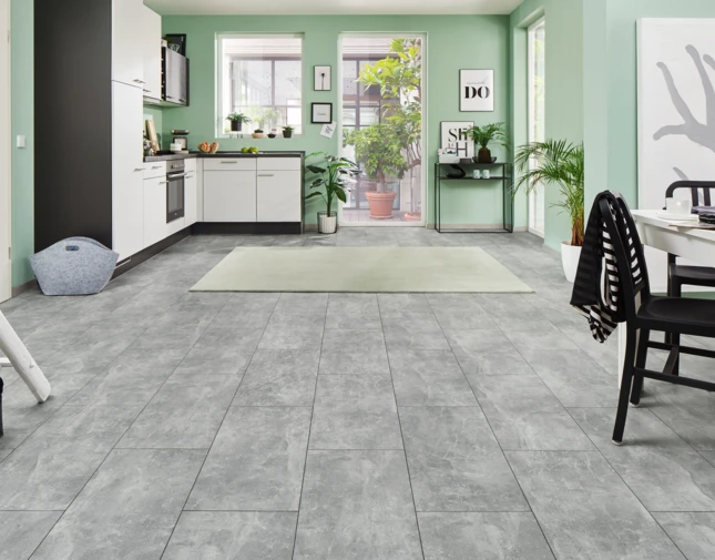 Grey stone look laminate flooring installed in kitchen